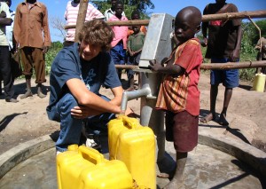 Ryan at a well in Uganda