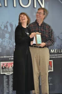 Tina receives Peace Award from Jim Watson